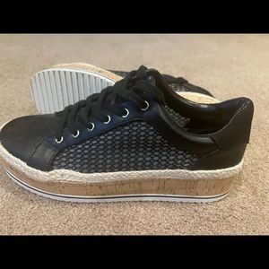 These are J Lo platform sneakers. Barely worn. Very light and comfortable